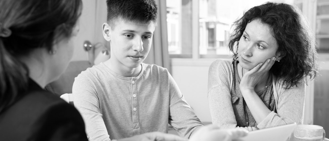 Social worker explaining to a family