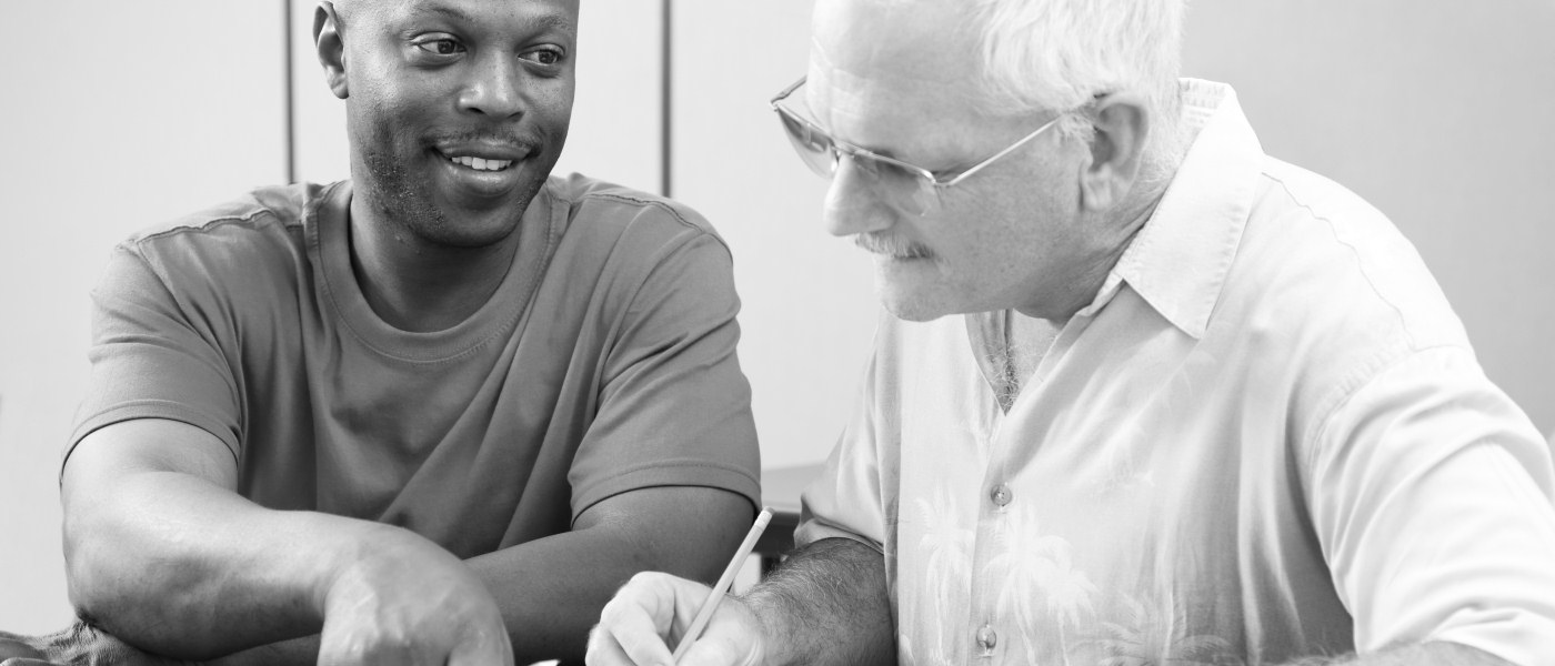 Social workers training with a family
